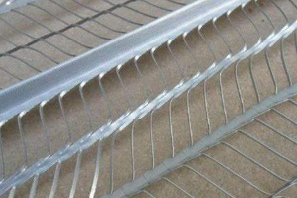 Self furred dimple ribbed metal lath for stucco and plastering